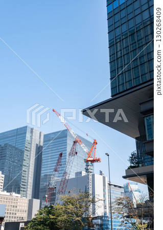 Urban landscape with skyscrapers under construction 130268409