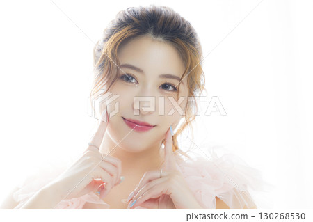 Woman in a pink tulle dress Woman in a pink tulle dress 130268530