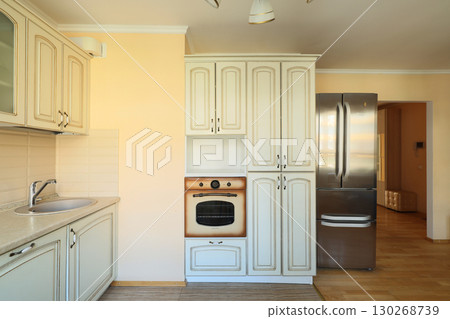 This stylish modern kitchen features classic design touches and highquality appliances This stylish modern kitchen features classic design touches and highquality appliances 130268739