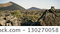 Landsape with volcanoes, mountains and volcanic rocky terrain. 130270058