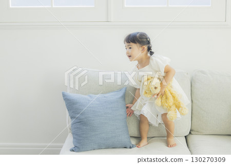 Children playing in the living room Children playing in the living room 130270309