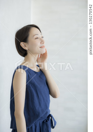 A woman who feels moisturized A woman who feels moisturized 130270542