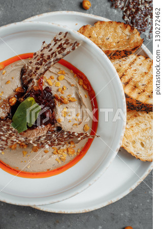 Mushroom cream soup on dark background. Champignon soup Mushroom cream soup on dark background. Champignon soup 130272462