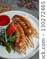 Grilled tasty bratwurst sausages on the plate 130272465
