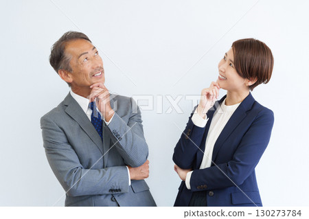 Thinking businessmen and women 130273784