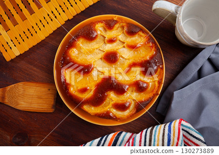 Baked in oven hot tasty apple pie served at plate 130273889