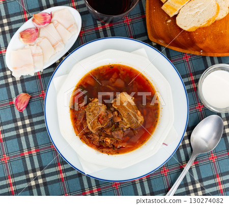 Borscht in bowl with sliced salo Borscht in bowl with sliced salo 130274082