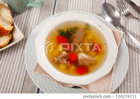 Rustic style soup in meat stock with pork and vegetables Rustic style soup in meat stock with pork and vegetables 130274151