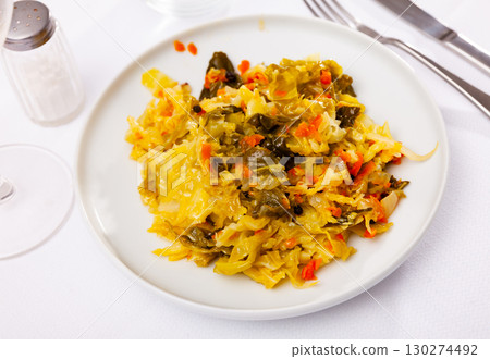 Spicy braised white cabbage as side dish or main course Spicy braised white cabbage as side dish or main course 130274492
