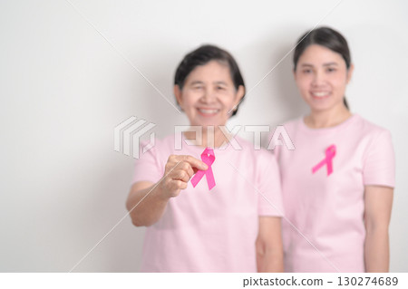 Couple woman with pink Ribbon for Pink October Breast Cancer Awareness month, May Women Health, November Birth Parents Adoption, women rights, Empowerment, March International Women day and Cancer day Couple woman with pink Ribbon for Pink October Breast Cancer Awareness month, May Women Health, November Birth Parents Adoption, women rights, Empowerment, March International Women day and Cancer day 130274689