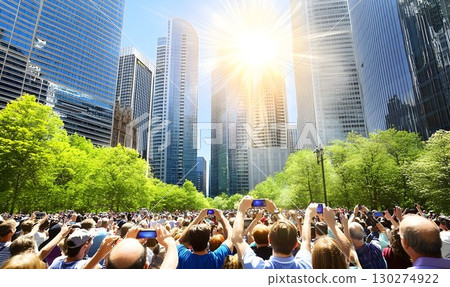 Cityscape Celebration: Crowds Capture Moment Amidst Skyscrapers 130274922