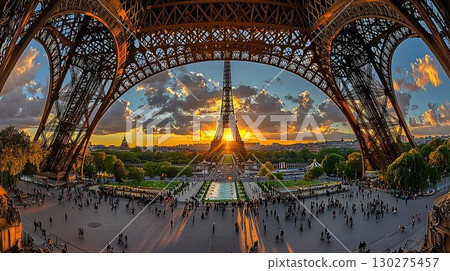 Eiffel Tower's golden hour: A captivating sunset view from benea 130275457
