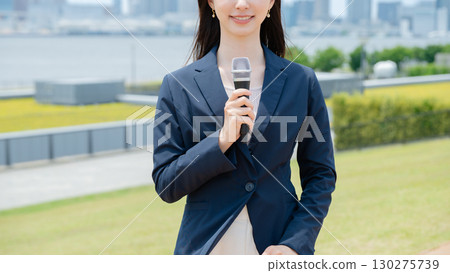 A woman with a microphone A woman with a microphone 130275739