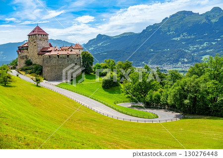 Scenic splendor Vaduz Castle towers above the charming landscape of Vaduz, Liechtenstein. 130276448