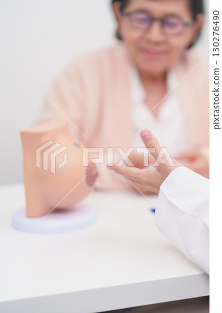 Elderly woman Patient consultation with doctor for Breast Augmentation Surgery, October Breast Cancer Awareness month, implant, Diagnosis, Beauty woman enlargement and medical healthcare concept Elderly woman Patient consultation with doctor for Breast Augmentation Surgery, October Breast Cancer Awareness month, implant, Diagnosis, Beauty woman enlargement and medical healthcare concept 130276490