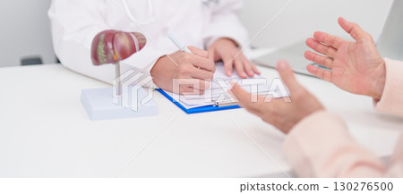 Doctor with human Liver anatomy. Elderly Patient consultation medical health for Liver cancer and Tumor, Jaundice, Viral Hepatitis, Cirrhosis, Failure, Enlarged, Hepatic Encephalopathy, Ascites Fluid 130276500