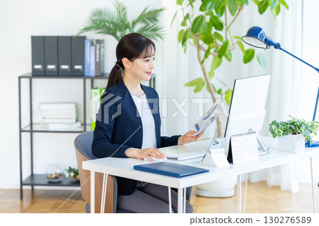 Business woman working in the office Business woman working in the office 130276589