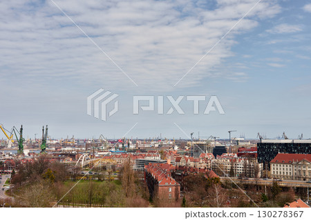 Panoramic view of Gdansk city with port cranes 130278367