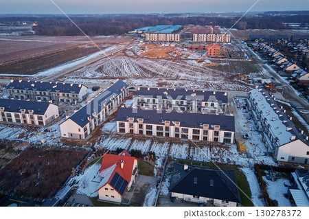 Aerial view of residential housing construction in winter 130278372