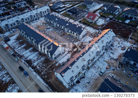 Aerial view of residential housing construction in winter Aerial view of residential housing construction in winter 130278373