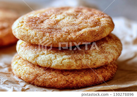 Cinnamon sugar cookies on wax paper 130278896