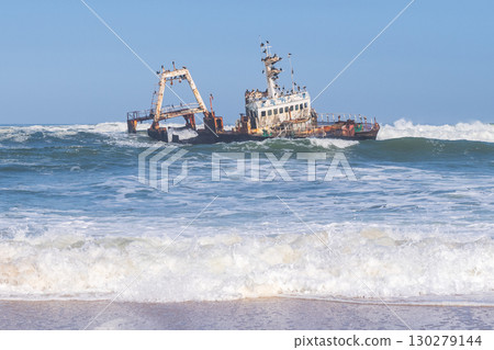 Wrecked trawler off the skeleton coast 130279144