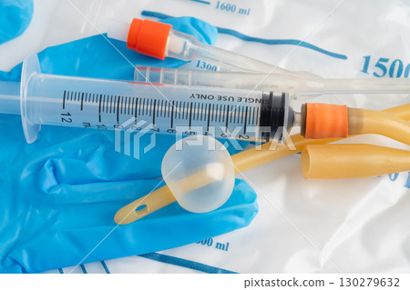 Foley catheter and urine drainage bag collect urine for disability or patient in hospital. 130279632