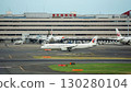 China Eastern Airlines plane taxiing down the runway 130280104