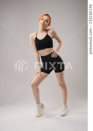 Elegant beauty poses in a unique lighting environment with artistic flair Elegant beauty poses in a unique lighting environment with artistic flair 130280146