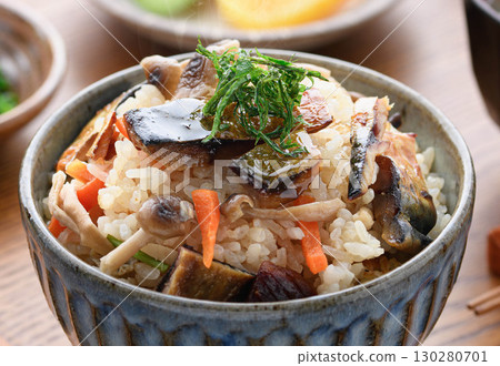 A steaming Japanese breakfast, lunch, and dinner set meal featuring a luxurious dish of mackerel jerky. A steaming Japanese breakfast, lunch, and dinner set meal featuring a luxurious dish of mackerel jerky. 130280701