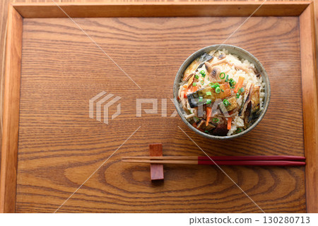 A steaming Japanese breakfast, lunch, and dinner set meal featuring a luxurious dish of mackerel jerky. 130280713