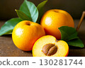 Fresh Yellow Fruit with Green Leaves on Wooden Surface Background 130281744