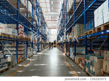 logistic warehouse. packing line in a logistics warehouse. conveyor belt in a modern production line logistic warehouse. packing line in a logistics warehouse. conveyor belt in a modern production line 130282072