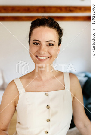 Confident woman taking a break, casual home portrait. 130282466