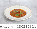 Traditional Georgian bean soup Lobio with herbs in ceramic plate 130282811