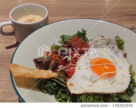 Taco rice with a fried egg and soup 130282956