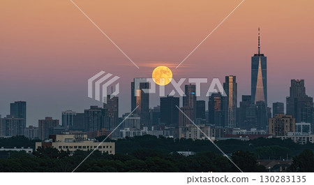 Harvest moon rises over city skyline. A beautiful celestial moon, a big moon 130283135
