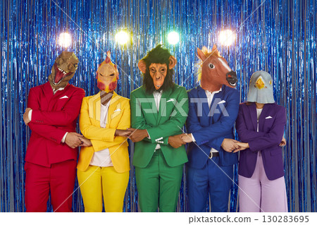 Group of young friends in a club on a shiny blue background. 130283695