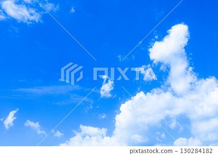 A simple landscape of blue sky and white clouds 130284182