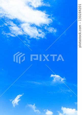 A simple landscape of blue sky and white clouds A simple landscape of blue sky and white clouds 130284201
