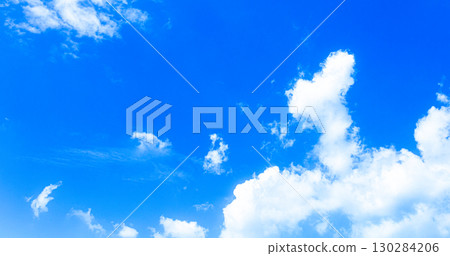 A simple landscape of blue sky and white clouds 130284206