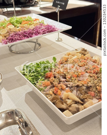 Buffet-style salads and appetizers, and party platters 130284533