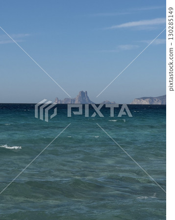 Turquoise waters meeting blue horizon in Formentera 130285149