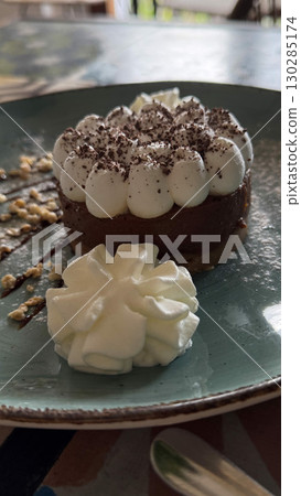 Chocolate dessert with whipped cream in Ibiza Chocolate dessert with whipped cream in Ibiza 130285174