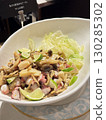 Buffet-style seafood and marinated mushroom dish 130285302