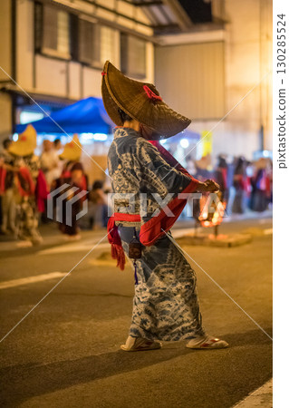 Nishimonai Bon Odori dance, men in indigo dyed yukata and straw hats, 2025, Akita Prefecture 130285524