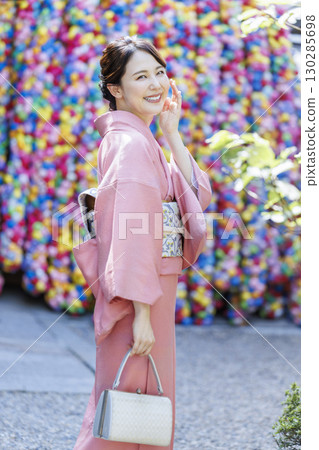 Kimono woman portrait at tourist attraction in Kyoto 130285698