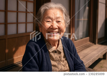 A Showa-era scene: Grandma sunbathing on the veranda 130285899
