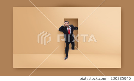 Creative digital artwork. Businessman stepping through doorway on beige wall with surprised face and stylish red tie 130285940