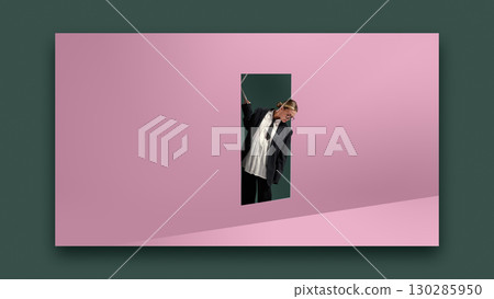 Bold poster. Businesswoman peeking through doorway on pink wall with curious emotion 130285950